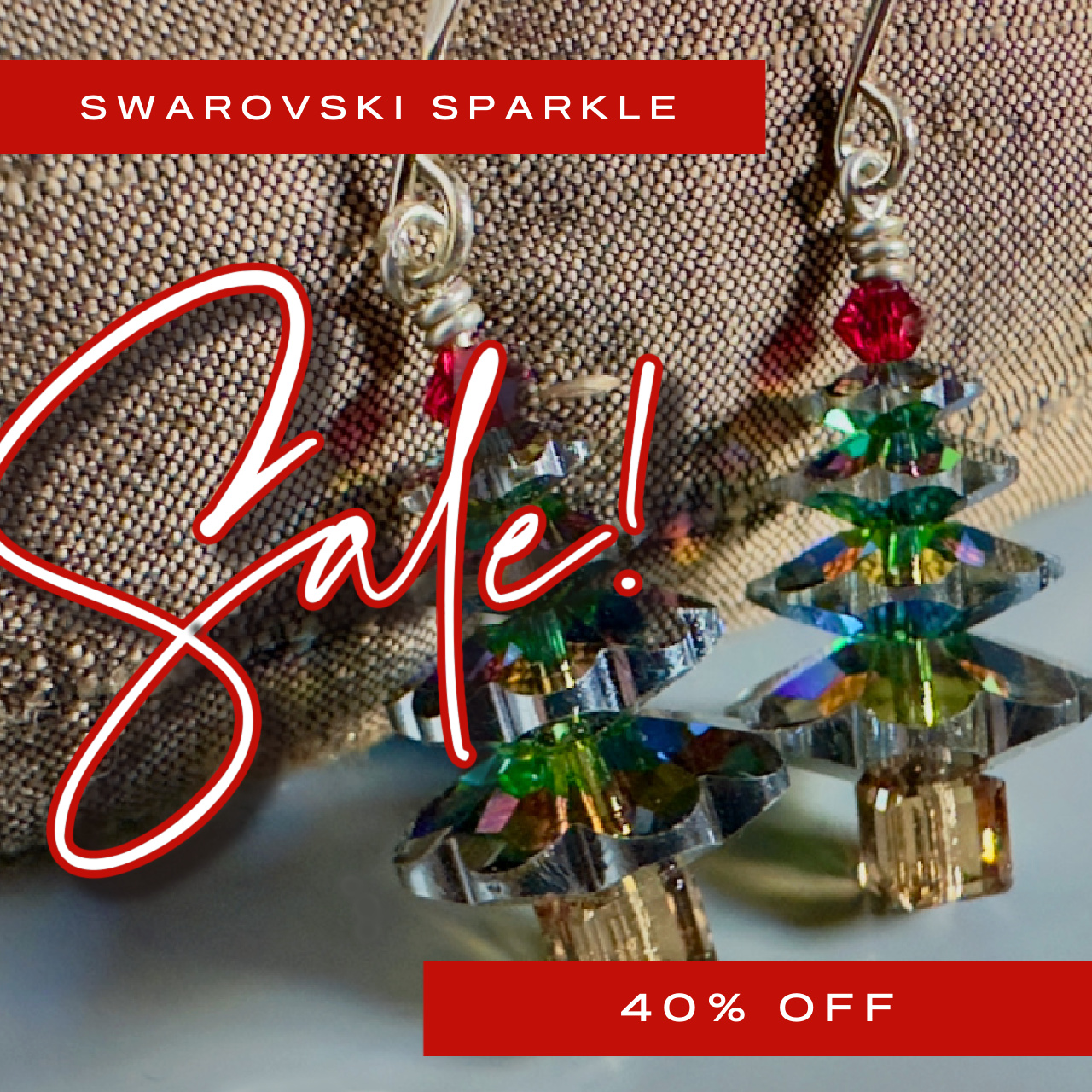 Sale promo graphic for 40 percent off Swarovski Christmas tree earrings. 