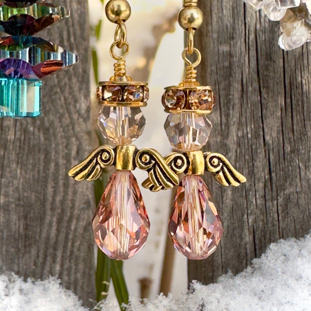 Swarovski crystal angel earrings on sale at 40% off at Suzie Q Studio